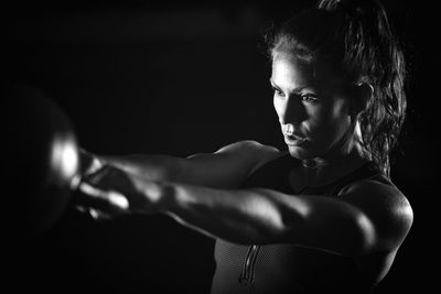 Woman exercising in gym