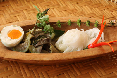Close-up of vegetables in basket on table