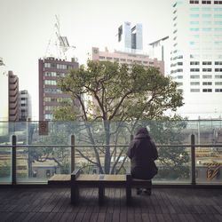 Woman standing in city