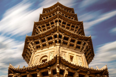 Low angle view of temple against sky