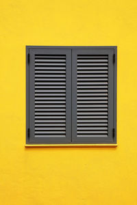 Close-up of yellow window