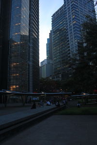 Modern buildings in city against sky