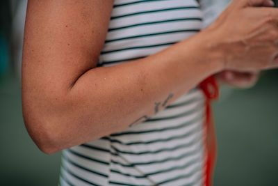 Close-up of woman holding hands