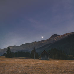 Scenic view of field against sky at night