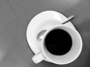 High angle view of coffee cup on table