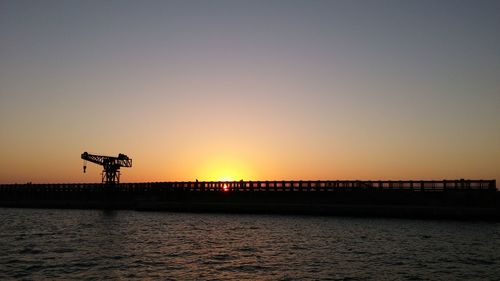 Scenic view of sea against sky at sunset