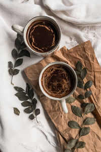 High angle view of coffee cup on table