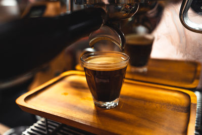 Close-up of coffee cup on table