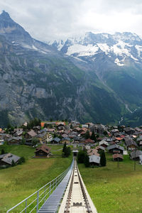 High angle view of buildings in city against sky