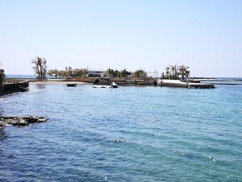 Scenic view of sea against clear sky