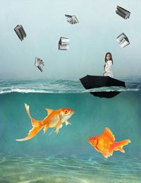 Woman jumping in sea