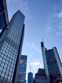 Low angle view of modern buildings against sky