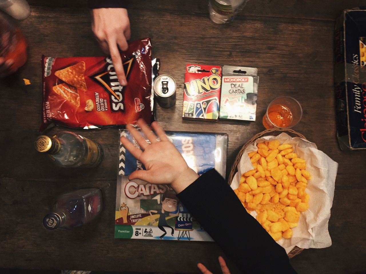 human hand, table, indoors, real people, food and drink, human body part, food, one person, close-up, freshness, day, people