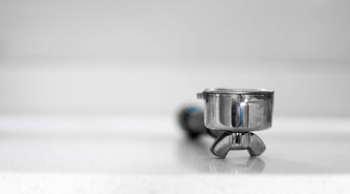 Close-up of electric lamp on table
