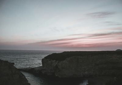 Scenic view of sea at sunset