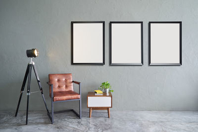 Blank picture frames mounted on wall