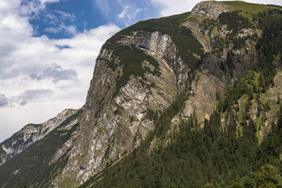 Low angle view of rocks against sky