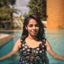 Portrait of young woman in swimming pool