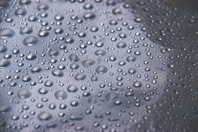 Raindrops on plastic cover texture background