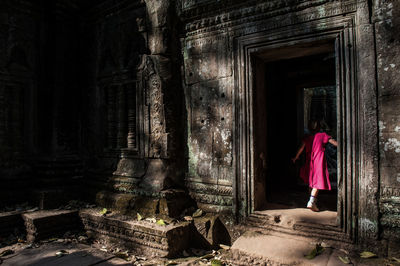 Man standing in front of house