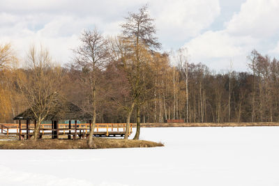 Scenic view of landscape against sky during winter