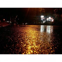 Reflection of illuminated buildings in water