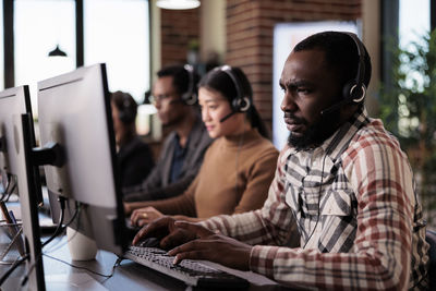 Business colleagues working at office