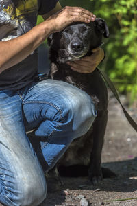 Man holding dog