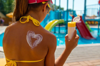 Young woman drinking water