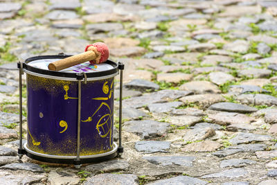 Small drum decorated on the cobblestones of the pelourinho slopes in salvador, bahia