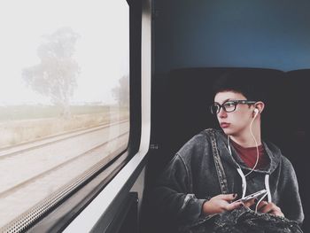 Man sitting in train