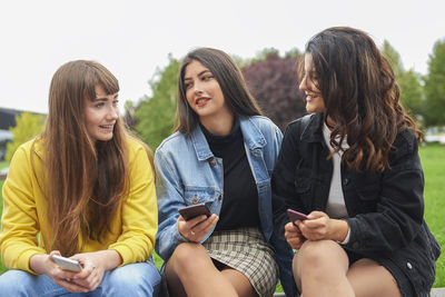 Young woman using smart phone