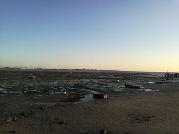 Scenic view of calm sea against clear sky