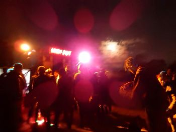 Group of people enjoying music concert