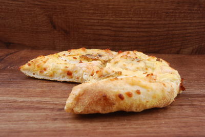 Close-up of pizza on cutting board