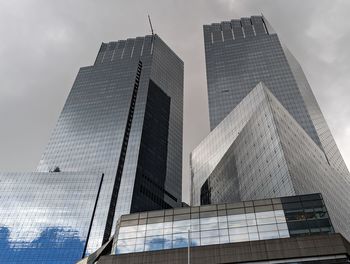 Low angle view of modern buildings against sky