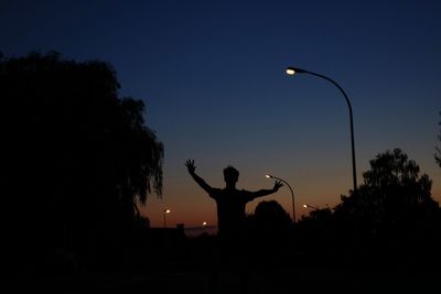 Silhouette of man at night