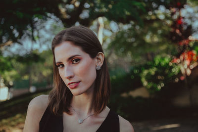 Portrait of beautiful woman standing outdoors