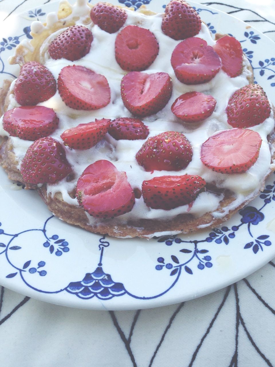 food and drink, food, freshness, indoors, sweet food, ready-to-eat, dessert, indulgence, strawberry, fruit, still life, red, unhealthy eating, plate, high angle view, temptation, table, close-up, cake