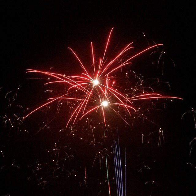 night, illuminated, long exposure, firework display, motion, exploding, celebration, arts culture and entertainment, firework - man made object, event, glowing, sparks, blurred motion, entertainment, firework, light trail, sky, fire - natural phenomenon, multi colored, dark