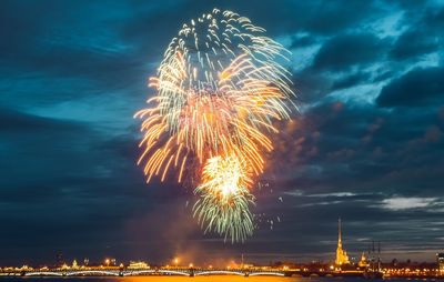 Firework display in sky at night