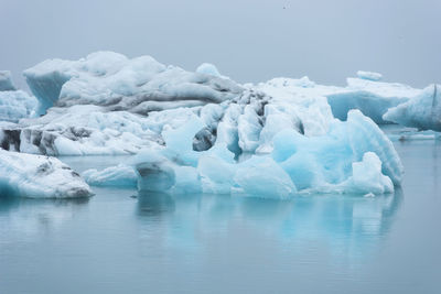 Melting icebergs as a result of global warming floating in jokulsarlon lagoon. iceland