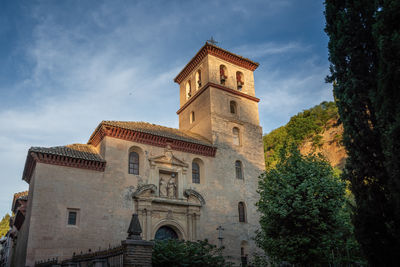 Low angle view of historic building against sky