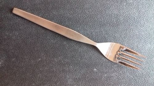 Close-up of fork over black background