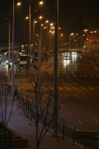 Illuminated road in city at night