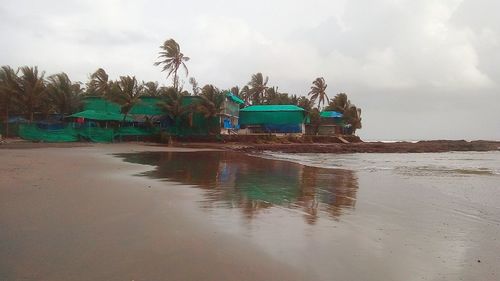 Scenic view of beach against sky