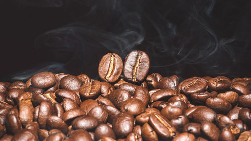 Close-up of coffee beans on table