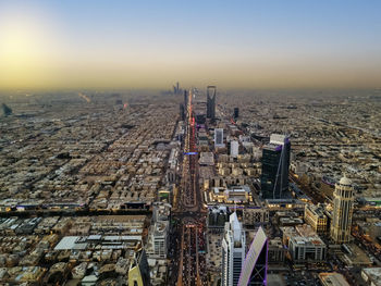 High angle view of cityscape against sky during sunset
