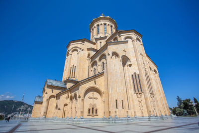 Low angle view of cathedral against clear blue sky