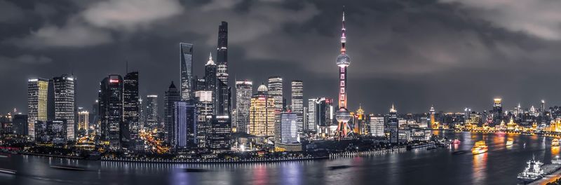 Low angle view of illuminated city at night